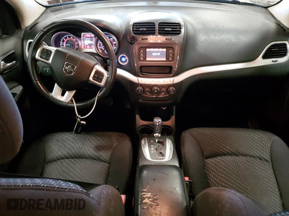 2013 Dodge Journey American Value with VIN 3C4PDCABXDT502334, listed as a Copart auction lot 58428235 with 162,009 mi miles and Clean title. Bid and sale history available at DreamBid. Image 8.