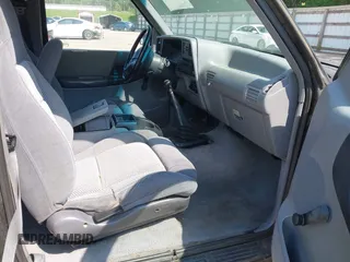 1993 Ford Ranger STX z VIN 1FTCR14U5PPB26328, wystawiony jako IAAI lot #42145116 z przebiegiem 60 664 mil mil oraz . Historia ofert i sprzedaży dostępna na DreamBid. Obrazek 5.