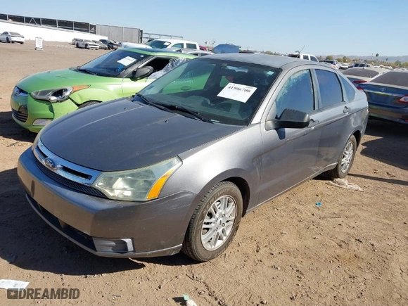 2009 Ford Focus SE with VIN 1FAHP35N79W166875, listed as a IAAI auction lot 41506700 with 174,061 mi miles. Bid and sale history available at carsss.com. Image 2.