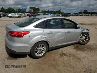 2017 Ford Focus SE with VIN 1FADP3F23HL328312, listed as a Copart auction lot 57028125 with 116,498 mi miles and Salvage title. Bid and sale history available at DreamBid. Image 3.