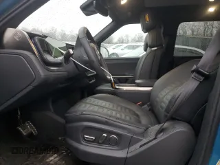 2024 Rivian R1S Adventure z VIN 7PDSGABA1RN031444, wystawiony jako Copart lot #43312765 z przebiegiem Nie podano mil oraz Szkody całkowita. Historia ofert i sprzedaży dostępna na DreamBid. Obrazek 7.