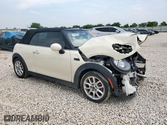 2017 MINI Convertible Cooper z VIN WMWWG5C32H3C20341, wystawiony jako Copart lot #57039685 z przebiegiem 100 575 mil mil oraz Szkoda całkowita • Salvage title. Historia ofert i sprzedaży dostępna na DreamBid. Obrazek 4.