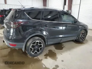 2015 Ford Escape Titanium with VIN 1FMCU9J91FUB77592, listed as a Copart auction lot 62727355 with 94,131 mi miles and Salvage title. Bid and sale history available at DreamBid. Image 3.