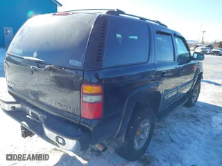 2001 Chevrolet Tahoe LS with VIN 1GNEK13T01J116989, listed as a IAAI auction lot 41871390 with 265,541 mi miles. Bid and sale history available at carsss.com. Image 4.