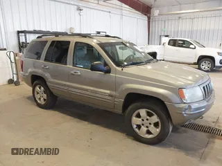 2001 Jeep Grand Cherokee Limited with VIN 1J4GW58S01C566671, listed as a IAAI auction lot 42193545 with 204,887 mi miles and . Bid and sale history available at DreamBid. Image 1.