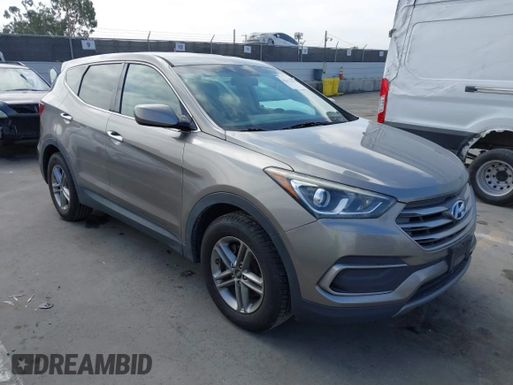 2018 Hyundai Santa Fe 2.4L with VIN 5NMZT3LB4JH069868, listed as a IAAI auction lot 42675555 with 142,612 mi miles and . Bid and sale history available at DreamBid. Image 1.