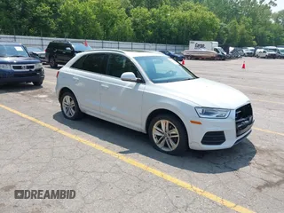 2016 Audi Q3 Premium Plus z VIN WA1EFCFSXGR014289, wystawiony jako IAAI lot #42440711 z przebiegiem 120 765 mil mil oraz . Historia ofert i sprzedaży dostępna na DreamBid. Obrazek 1.