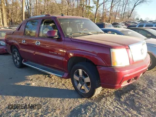 2004 Cadillac Escalade EXT z VIN 3GYEK62N84G243238, wystawiony jako IAAI lot #41284186 z przebiegiem 110 945 mil mil oraz . Historia ofert i sprzedaży dostępna na DreamBid. Obrazek 1.