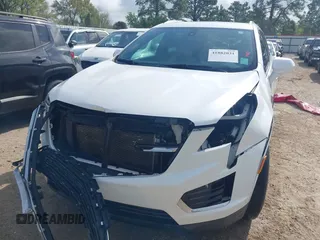 2017 Cadillac XT5 FWD with VIN 1GYKNARS0HZ107734, listed as a IAAI auction lot 41882031 with 89,397 mi miles. Bid and sale history available at carsss.com. Image 6.