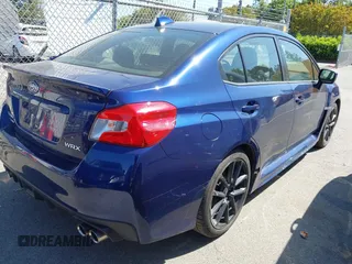 2021 Subaru WRX Premium with VIN JF1VA1C63M9814059, listed as a IAAI auction lot 42039228 with 87,437 mi miles. Bid and sale history available at carsss.com. Image 4.
