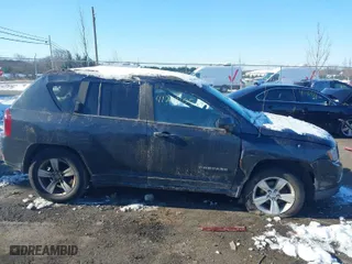 2015 Jeep Compass Latitude with VIN 1C4NJDEB6FD217056, listed as a IAAI auction lot 41269105 with 152,403 mi miles. Bid and sale history available at carsss.com. Image 13.