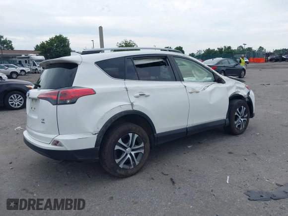 2018 Toyota RAV4 LE with VIN JTMBFREV6JJ210226, listed as a IAAI auction lot 42700312 with Not provided miles and . Bid and sale history available at DreamBid. Image 4.