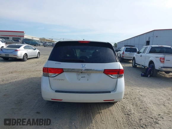 2016 Honda Odyssey EX-L z VIN 5FNRL5H60GB011001, wystawiony jako IAAI lot #41897958 z przebiegiem 126 133 mil mil oraz . Historia ofert i sprzedaży dostępna na DreamBid. Obrazek 16.
