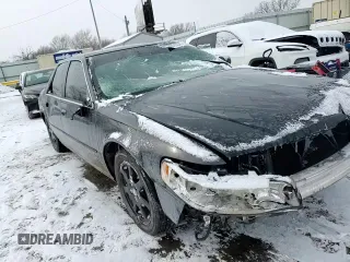 2002 Cadillac Seville Touring STS z VIN 1G6KY549X2U177791, wystawiony jako Copart lot #89313345 z przebiegiem 171 707 mil mil oraz Szkoda całkowita • Salvage title. Historia ofert i sprzedaży dostępna na DreamBid. Obrazek 11.