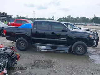 2016 Toyota Tacoma SR5 z VIN 5TFAZ5CN6GX012718, wystawiony jako IAAI lot #42408153 z przebiegiem 136 571 mil mil oraz . Historia ofert i sprzedaży dostępna na DreamBid. Obrazek 13.