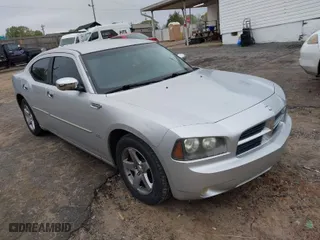 2009 Dodge Charger SXT with VIN 2B3KA33V69H546018, listed as a IAAI auction lot 41957347 with 109,648 mi miles. Bid and sale history available at carsss.com. Image 1.
