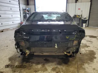 2016 Lincoln MKZ with VIN 3LN6L2JK4GR629425, listed as a Copart auction lot 52854645 with 127,981 mi miles and Salvage title. Bid and sale history available at DreamBid. Image 6.