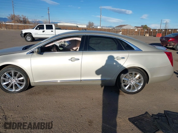 2014 Cadillac XTS Luxury z VIN 2G61N5S3XE9298471, wystawiony jako IAAI lot #41069292 z przebiegiem 92 112 mil mil oraz . Historia ofert i sprzedaży dostępna na DreamBid. Obrazek 13.
