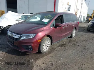 2018 Honda Odyssey EX-L with VIN 5FNRL6H73JB028770, listed as a IAAI auction lot 41984094 with 96,819 mi miles and . Bid and sale history available at DreamBid. Image 2.