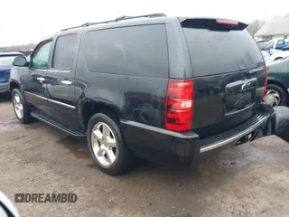 2012 Chevrolet Suburban LTZ with VIN 1GNSKKE74CR257156, listed as a IAAI auction lot 41486869 with 168,049 mi miles. Bid and sale history available at carsss.com. Image 3.