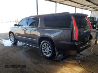 2015 GMC Yukon XL Denali with VIN 1GKS2JKJ1FR615647, listed as a Copart auction lot 67737263 with 183,728 mi miles and Salvage Title. Bid and sale history available at carsss.com. Image 2.