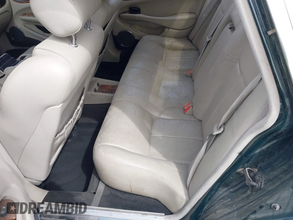 2003 Jaguar XJ with VIN SAJDA15B73MF53499, listed as a IAAI auction lot 41896445 with 95,055 mi miles and . Bid and sale history available at DreamBid. Image 8.