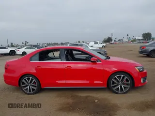 2014 Volkswagen Jetta GLI with VIN 3VW4T7AJ2EM246347, listed as a IAAI auction lot 42553341 with 140,793 mi miles and . Bid and sale history available at DreamBid. Image 13.
