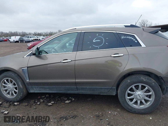 2015 Cadillac SRX Luxury Collection with VIN 3GYFNBE34FS521518, listed as a IAAI auction lot 41893073 with 82,700 mi miles and . Bid and sale history available at carsss.com. Image 14.