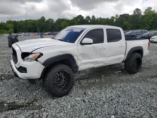 2021 Toyota Tacoma SR z VIN 3TMCZ5AN4MM386662, wystawiony jako Copart lot #56954865 z przebiegiem 70 623 mil mil oraz Szkoda całkowita • Salvage title. Historia ofert i sprzedaży dostępna na DreamBid. Obrazek 1.