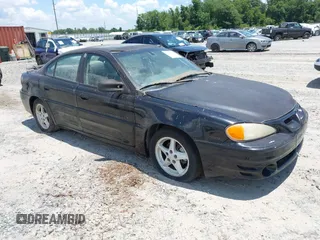 2000 Pontiac Grand Am GT1 with VIN 1G2NV52EXYM809446, listed as a IAAI auction lot 42556675 with Not provided miles and . Bid and sale history available at DreamBid. Image 1.