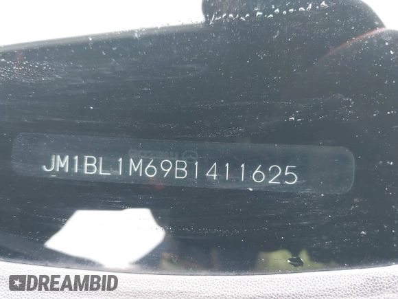 2011 Mazda 3 S Grand Touring z VIN JM1BL1M69B1411625, wystawiony jako IAAI lot #41778143 z przebiegiem 133 987 mil mil oraz . Historia ofert i sprzedaży dostępna na DreamBid. Obrazek 9.
