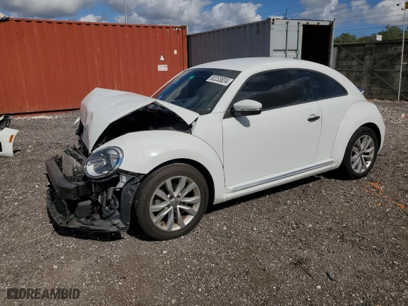 2017 Volkswagen Beetle 1.8T Fleet with VIN 3VWF17AT1HM617468, listed as a Copart auction lot 82233824 with 72,800 mi miles and Salvage Title. Bid and sale history available at carsss.com. Image 1.