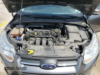 2014 Ford Focus SE z VIN 1FADP3K21EL424134, wystawiony jako Copart lot #56692545 z przebiegiem 46 342 mil mil oraz Szkoda całkowita • Salvage title. Historia ofert i sprzedaży dostępna na DreamBid. Obrazek 11.