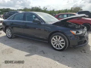 2014 Audi A6 Prestige z VIN WAUHGAFC8EN062243, wystawiony jako Copart lot #54622005 z przebiegiem 106 729 mil mil oraz Szkoda całkowita • Salvage title. Historia ofert i sprzedaży dostępna na DreamBid. Obrazek 4.