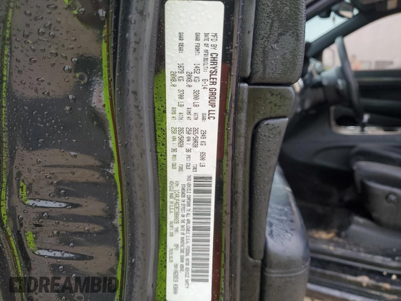2014 Jeep Grand Cherokee Altitude with VIN 1C4RJFAG3EC580028, listed as a Copart auction lot 50611035 with 146,479 mi miles and Salvage Title. Bid and sale history available at carsss.com. Image 16.