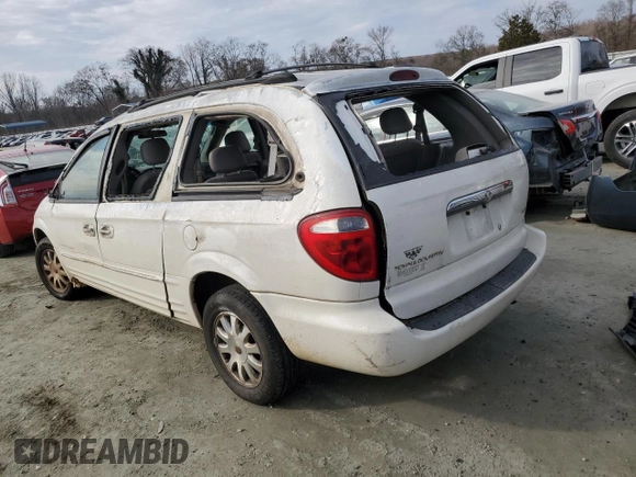2001 Chrysler Town & Country LXi with VIN 2C8GP54L11R402563, listed as a Copart auction lot 86108164 with 179,021 mi miles and Salvage Title. Bid and sale history available at DreamBid. Image 2.
