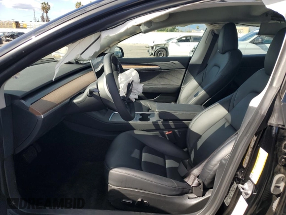2023 Tesla Model 3 z VIN 5YJ3E1EA3PF713735, wystawiony jako Copart lot #51821995 z przebiegiem Nie podano mil oraz Szkoda całkowita • Salvage title. Historia ofert i sprzedaży dostępna na DreamBid. Obrazek 7.