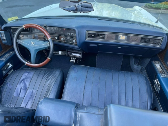 1973 Cadillac Eldorado z VIN 6L67S3Q410957, wystawiony jako Copart lot #64316435 z przebiegiem 74 584 mil mil oraz Czysty tytuł • Clean title. Historia ofert i sprzedaży dostępna na DreamBid. Obrazek 9.