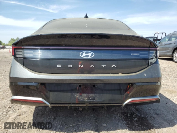 2024 Hyundai Sonata SEL z VIN KMHL14JA4RA409095, wystawiony jako Copart lot #53632675 z przebiegiem 11 619 mil mil oraz Szkoda całkowita • Salvage title. Historia ofert i sprzedaży dostępna na DreamBid. Obrazek 6.