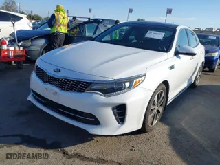 2016 Kia Optima SXL Turbo with VIN 5XXGV4L2XGG050949, listed as a IAAI auction lot 41448085 with 119,850 mi miles. Bid and sale history available at carsss.com. Image 2.