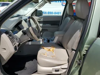 2010 Mercury Mariner with VIN 4M2CN8BG8AKJ11564, listed as a Copart auction lot 64171555 with 180,034 mi miles and Salvage title. Bid and sale history available at DreamBid. Image 7.