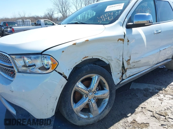 2013 Dodge Durango Citadel z VIN 1C4RDJEG6DC638023, wystawiony jako IAAI lot #41761307 z przebiegiem 405 864 mil mil oraz . Historia ofert i sprzedaży dostępna na DreamBid. Obrazek 6.