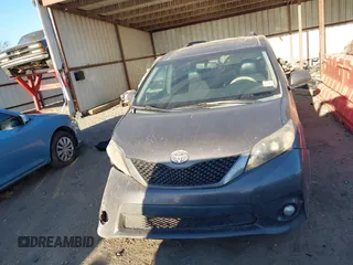2014 Toyota Sienna SE with VIN 5TDXK3DC1ES462473, listed as a IAAI auction lot 41811437 with 209,704 mi miles and . Bid and sale history available at DreamBid. Image 12.