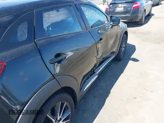 2018 Mazda CX-3 Grand Touring z VIN JM1DKFD75J0312662, wystawiony jako IAAI lot #41805287 z przebiegiem 140 083 mil mil oraz . Historia ofert i sprzedaży dostępna na DreamBid. Obrazek 6.