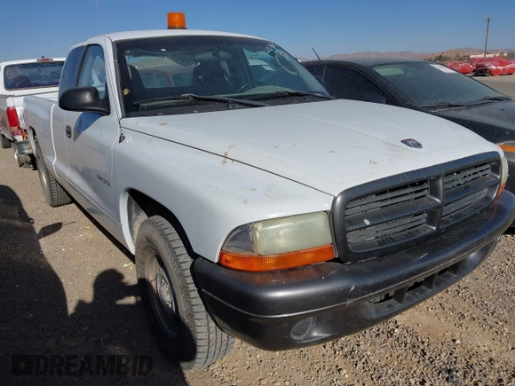 2002 Dodge Dakota with VIN 1B7GL12X32S701273, listed as a IAAI auction lot 41552573 with 157,212 mi miles and . Bid and sale history available at carsss.com. Image 1.