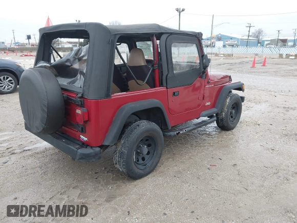 1999 Jeep Wrangler SE with VIN 1J4FY29P6XP408738, listed as a IAAI auction lot 41716999 with 124,692 mi miles. Bid and sale history available at carsss.com. Image 4.