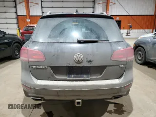 2013 Volkswagen Touareg Sport с VIN WVGEP9BP5DD008301, выставлен на аукционе Copart как лот 85085984 с пробегом 204 735 миль миль и Списание • Salvage title. История ставок и продаж доступна на DreamBid. Изображение 6.