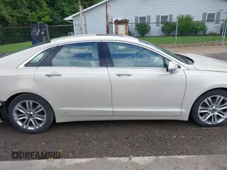 2014 Lincoln MKZ z VIN 3LN6L2G95ER808560, wystawiony jako IAAI lot #42288383 z przebiegiem 97 298 mil mil oraz . Historia ofert i sprzedaży dostępna na DreamBid. Obrazek 14.