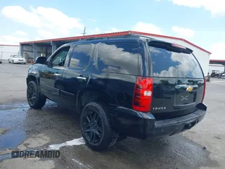 2013 Chevrolet Tahoe LT with VIN 1GNSCBE00DR337071, listed as a IAAI auction lot 42282457 with 151,460 mi miles and . Bid and sale history available at DreamBid. Image 3.