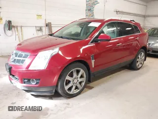 2012 Cadillac SRX Performance Collection with VIN 3GYFNEE36CS657582, listed as a IAAI auction lot 42084319 with 171,335 mi miles. Bid and sale history available at carsss.com. Image 2.